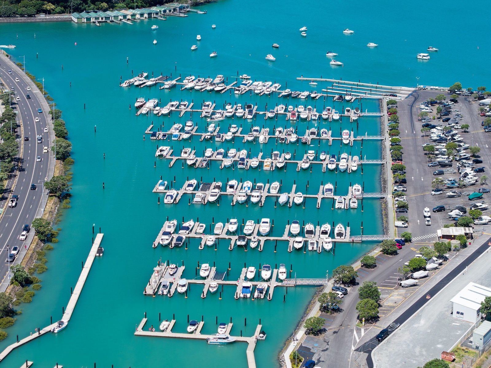 Trailer boats and launches berthed at the Outboard Boating Club marina, Auckland, from the air