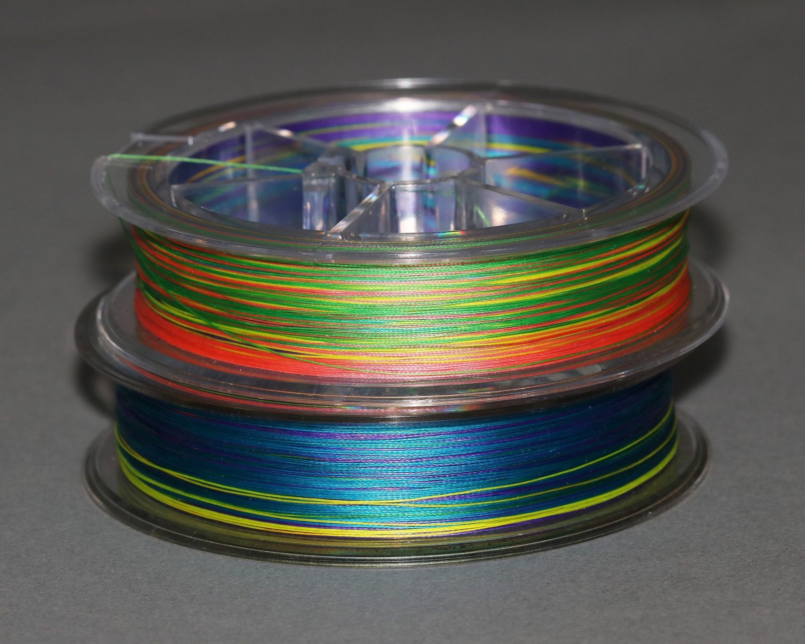 Spools of multicoloured braided fishing line