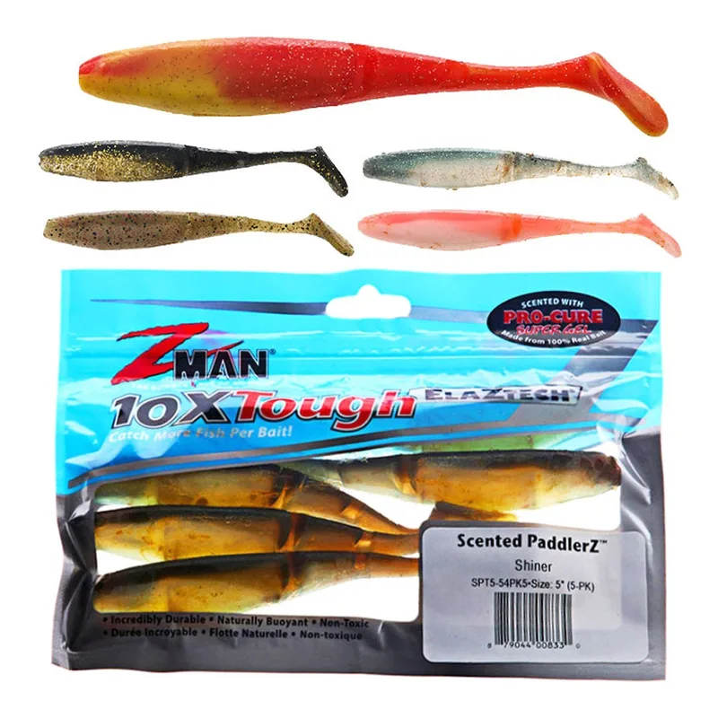 Z-Man PaddlerZ paddle tail soft baits in orange, gold and blue above a pack